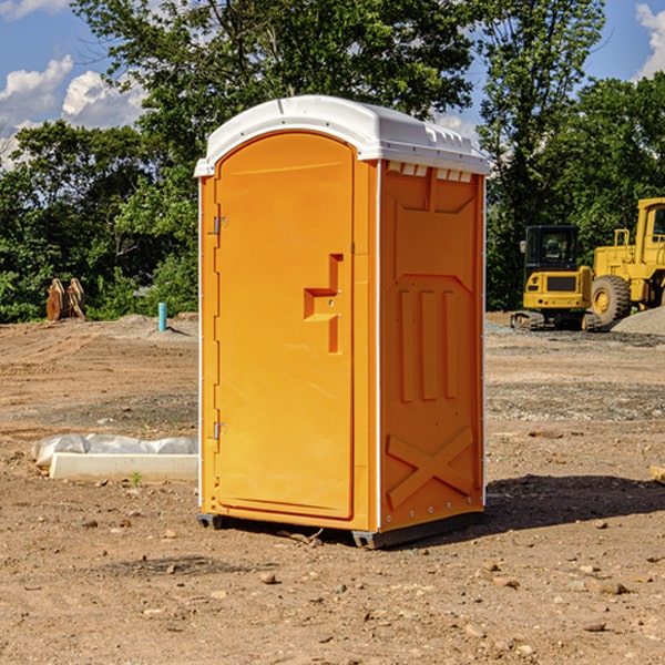 what is the cost difference between standard and deluxe portable restroom rentals in Irvington